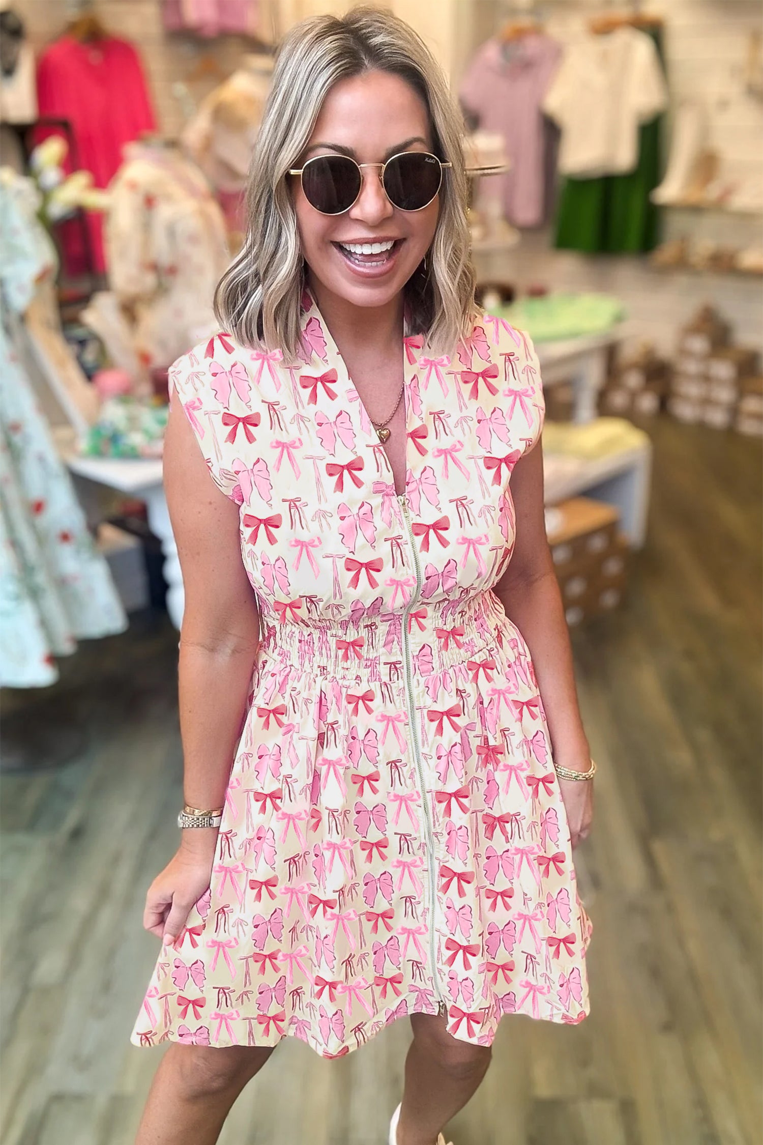 Pink Full Zip Cinched Waist Sleeveless Bow Mini Dress